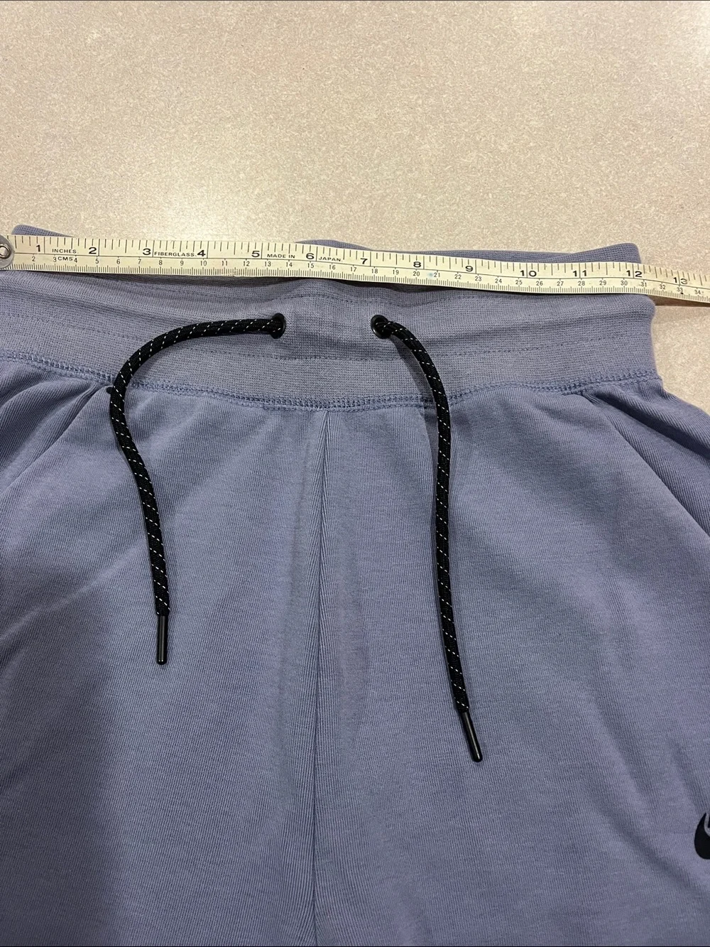Nike Tech Light Blue Joggers with Black Accents